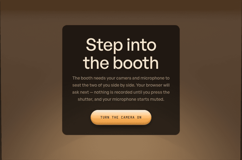 Camera introduction inside the booth, showing the Turn the camera on button
